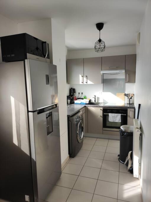 Charmant Appartement Proche Paris อูเบินน์ ภายนอก รูปภาพ